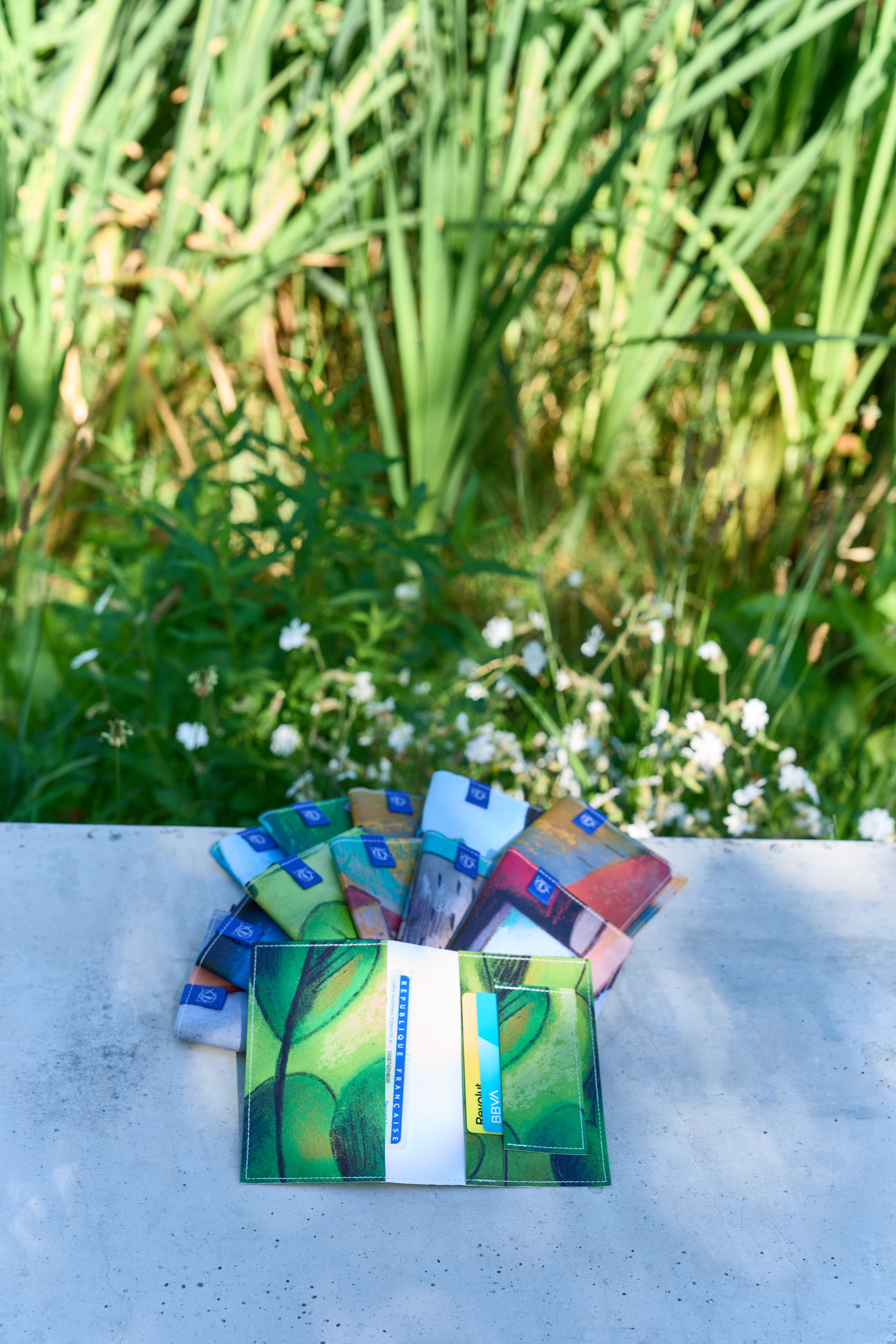 Shot of Passport Holders on Stone Bench 