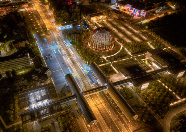 Aerial view of CERN by night postcard